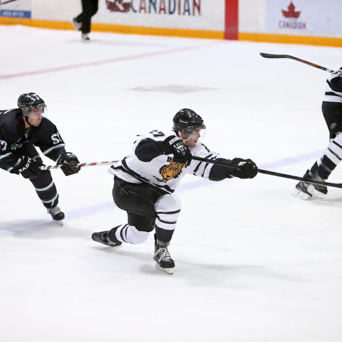 Brett Theberge (27) puts a shot on net in an earlier contest. (Photo by Nick Pearce via Dal Athletics)