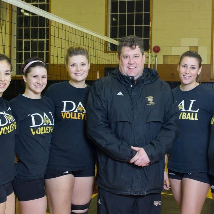 Dal volleyball stars, from left, Hilary Sears, Tara-Lynn Truant, Maggie Powers, coach Rick Scott, Louise Facca and Raeesa Lalani. (David Munro photo)