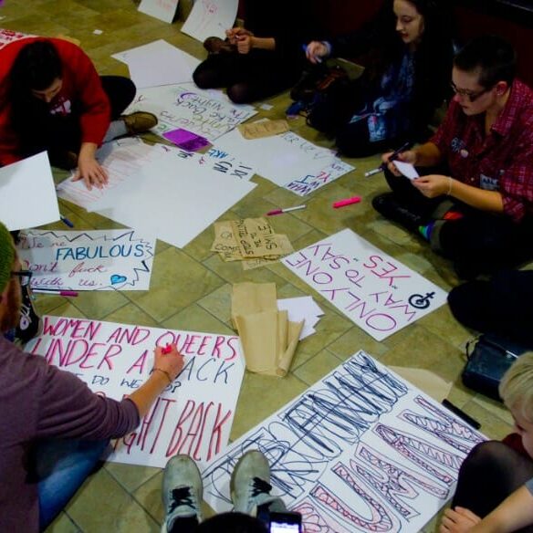 Protesters made signs at the SUB before rallying to the march (photo by Chris Parent