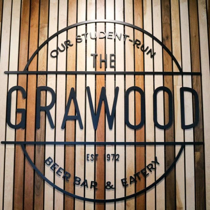 In this image: The Grawood's sign.