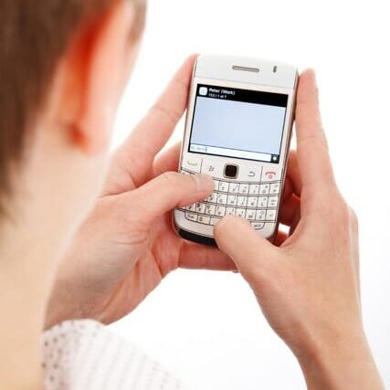 Spellcheck is standard on phones – use it! | Photo by Petr Kratochvil via FreeStockPhotos