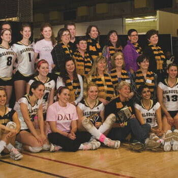 Present Tigers and their 1982 national championship brethren unite on the court, Feb 10. Photo by Rob Grandy