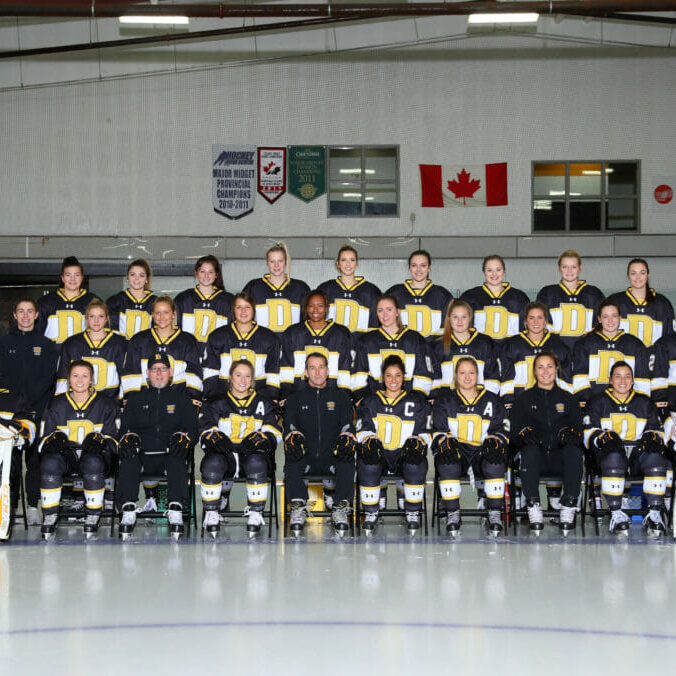 In this image: Dal's women's hockey team for the 2018-2019 year.